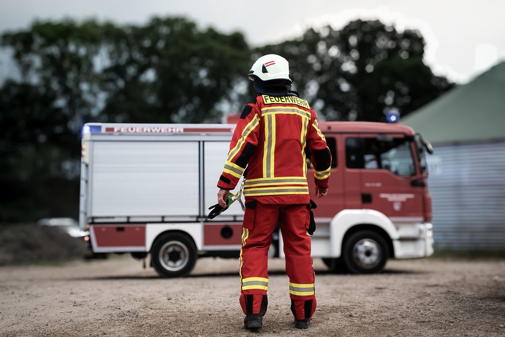 Feuerwehrmann und Feuerwehrautoa
